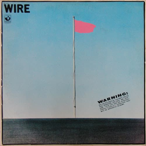 Pink Flag by Wire album cover — A tall flagpole rises against an almost empty pale sky, topped by a small, vivid pink flag; the album title and band name sit discreetly within…